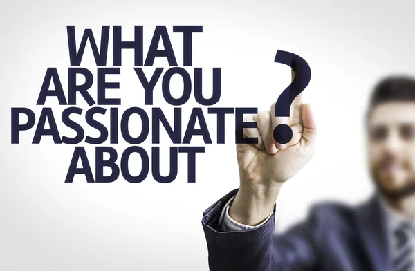 Business man pointing the text: What are you Passionate About?