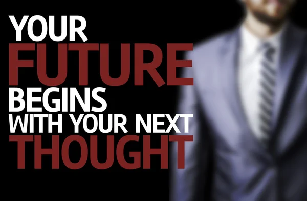 Your Future Begins With Your Next Thought written on a board