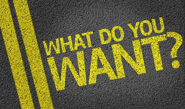 What Do You Want? written on the road - 图库照