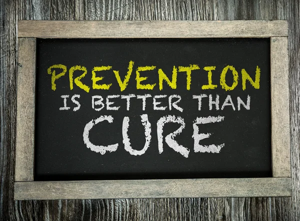 Prevention is Better than Cure on chalkboard