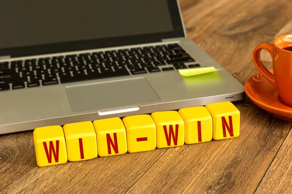 Win-Win written on a wooden cubes