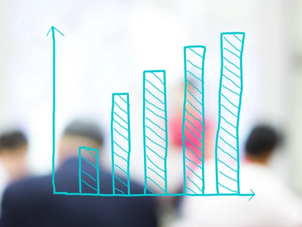 Growth bar chart with blurred business people background