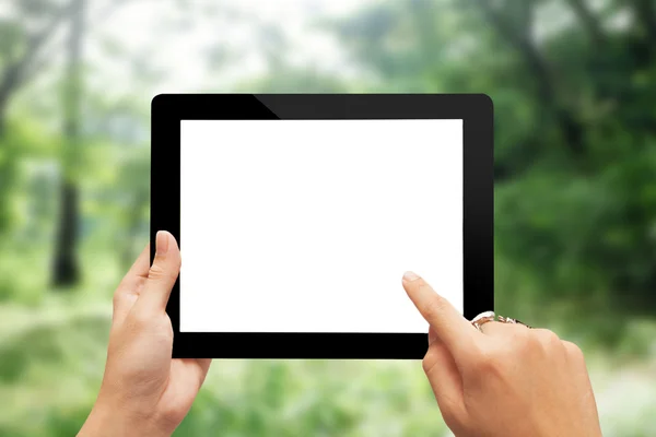 Hand holding black digital tablet