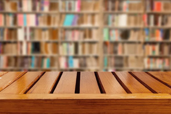 Empty wooden table and modern library background