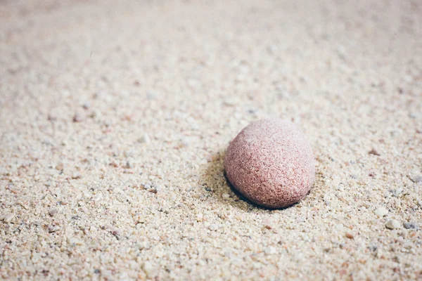 Zen garden sand waves and rock sculptures. Retro grainy film loo