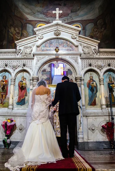 Couple at the altar during the wedding ceremony