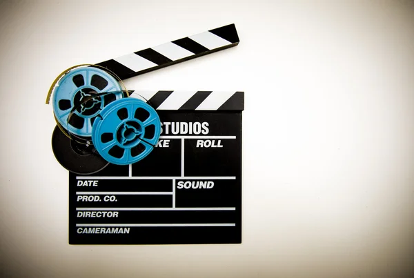 Clapper board and 8mm film reels color effect