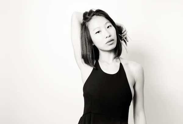 Beautiful seductive asian woman black and white  portrait white