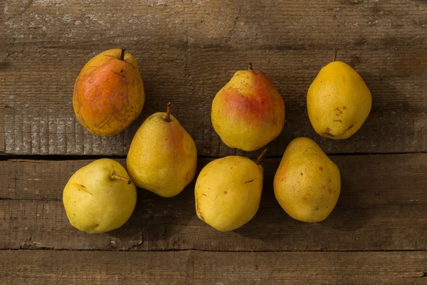 Yellow Pears On The Wooden Table