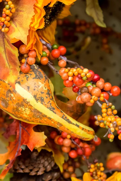Fall colors home decorations - leaves, pumpkins and berries
