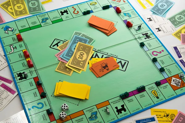 Monopoly board game in play