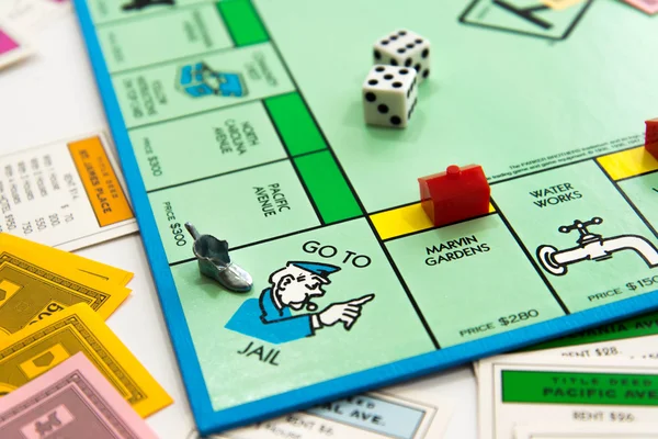 Monopoly board game in play