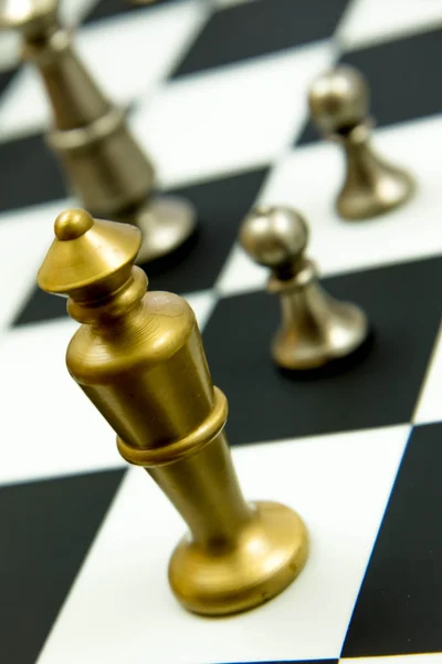 Chess game - king and pawns on chessboard