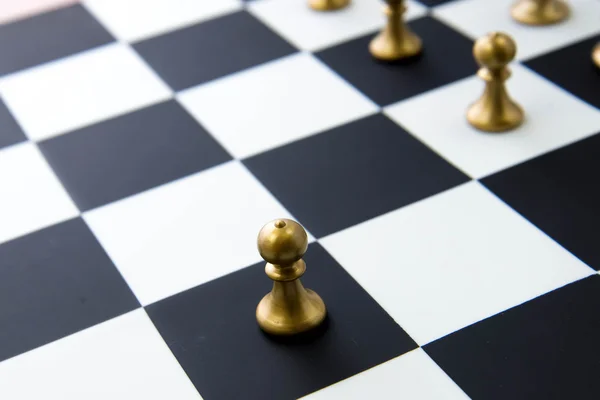 Chess game - pawn alone in front on chessboard