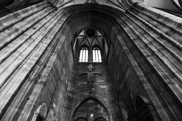 Vienna, Austria/October 24, 2015: Stephens cathedral interior. Wide Perspective photo of the Gothic Catholic Church with vintage black and white toning.
