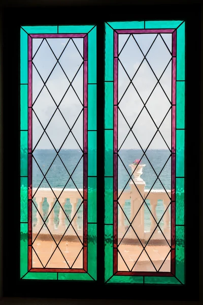 Seaview through the stained-glass window
