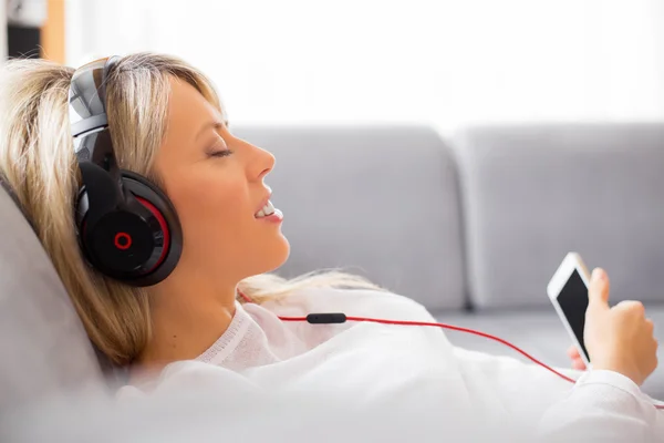 Relaxed woman listening to music