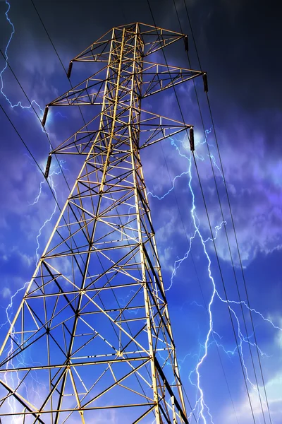 Electricity Pylon with Lightning in Background.