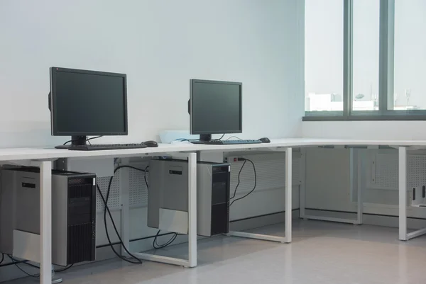 Workplace room with computers