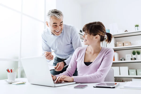 Cheerful business people in the office