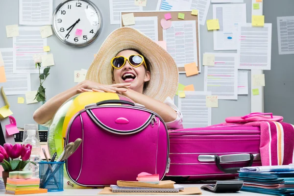 Cheerful employee leaving for vacations
