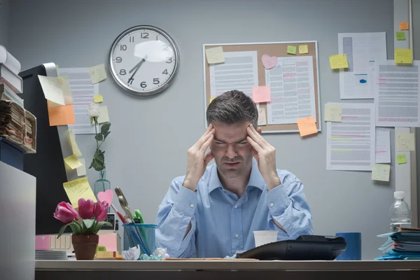 Office worker with headache