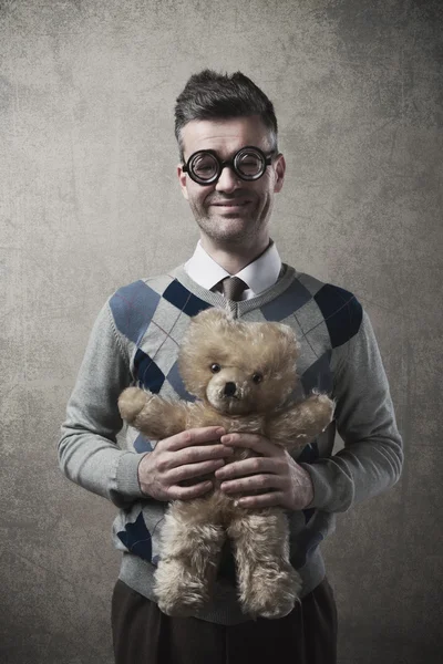Guy holding a teddy bear