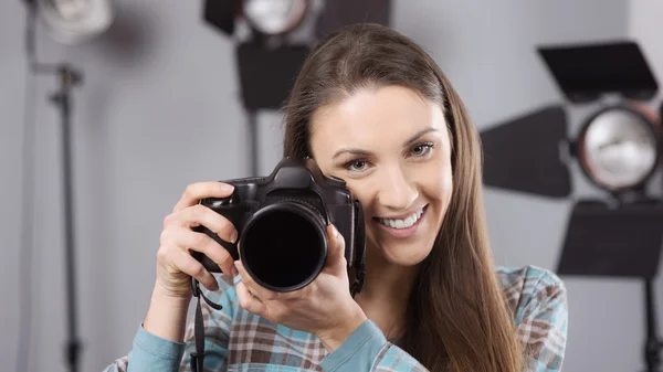 Photographer posing in a professional studio