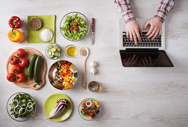 Man searching for recipes online