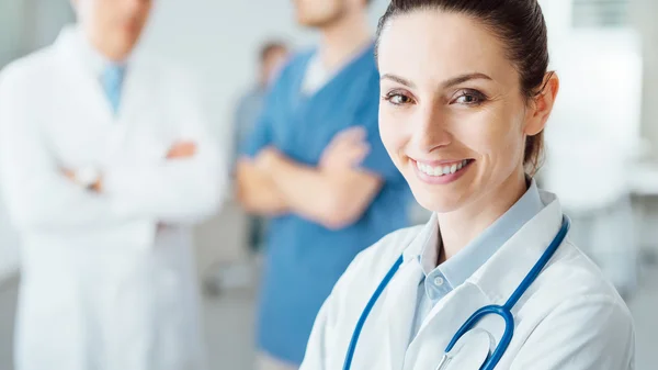 Professional female doctor posing and smiling