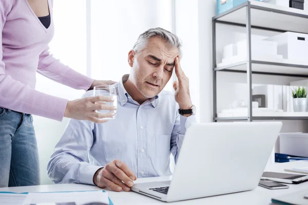 Businessman having an headache