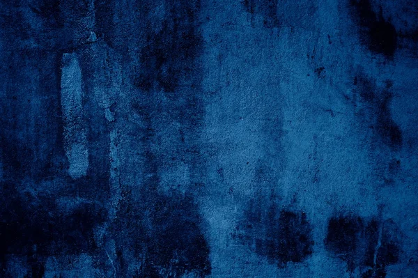 Grunge background of blue concrete wall