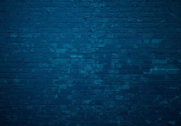 Dark blue brick wall as background