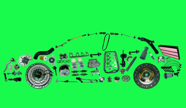 Car from lot of spare parts isolated on green background