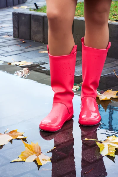 Woman in rain boots