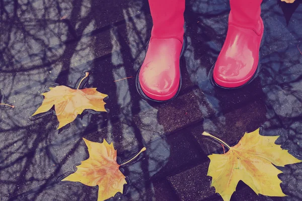 Woman in rain boots