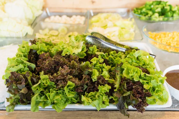 Healthy food. salad bar with fresh vegetables