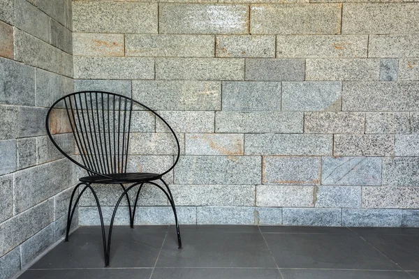 Chair with space with the brickwall in the background