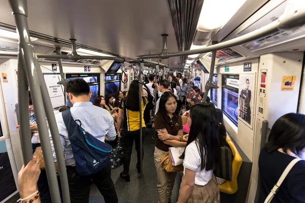 Crowd of the passengers inside BTS public train