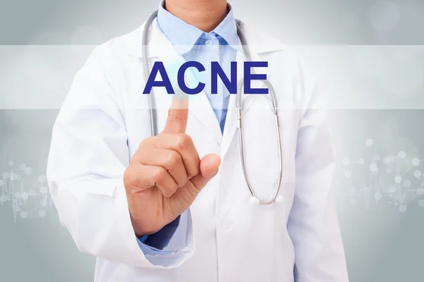 Doctor touching acne sign