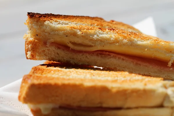 Toast with ham and cheese, close up