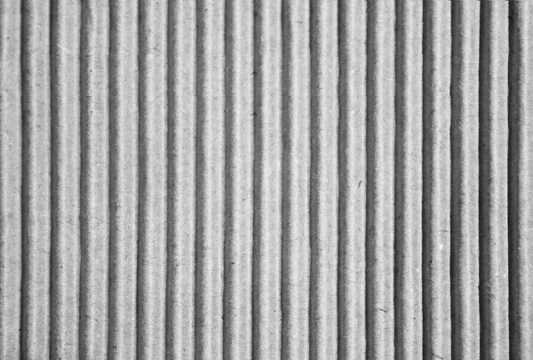 Cardboard paper background bright vertical corrugated strips