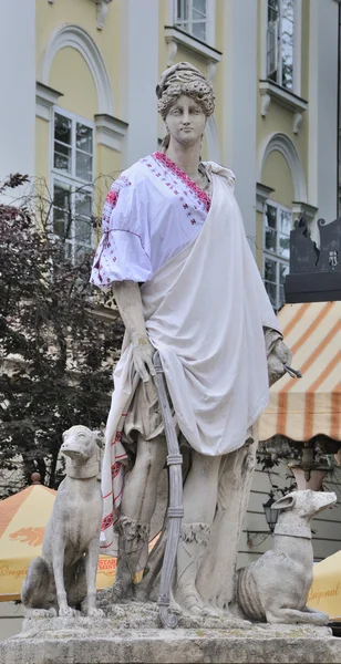 An ancient statue  in the central square of Lviv - Market (Rynok