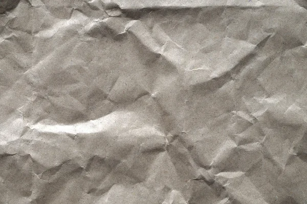 Brown paper with crease for background.