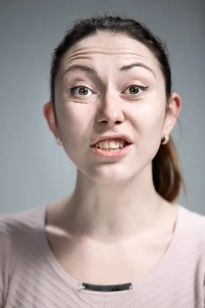 Portrait of disgusted woman