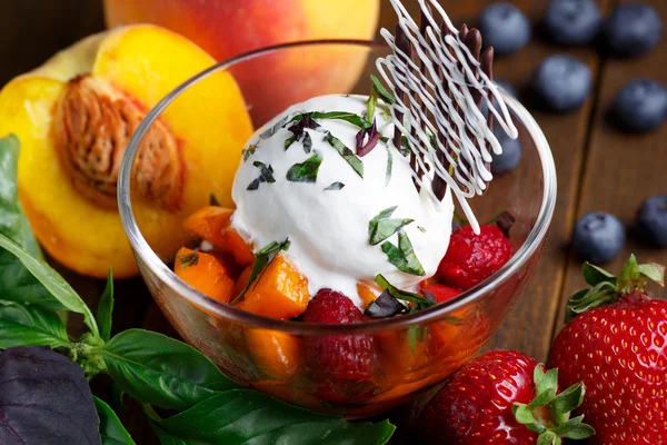 Ice cream ball with fresh fruits