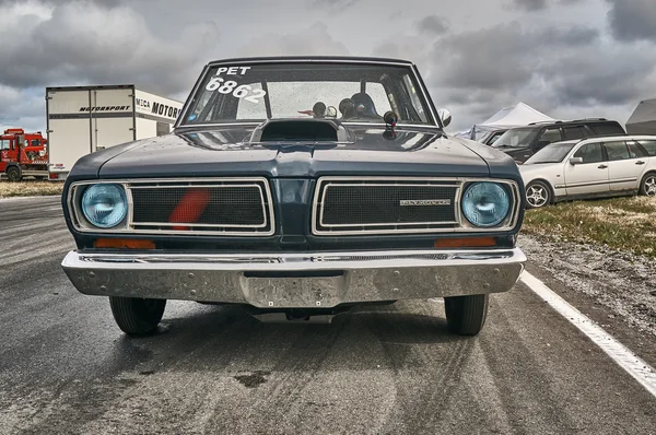 Norway drag racing, navy blue race car side view