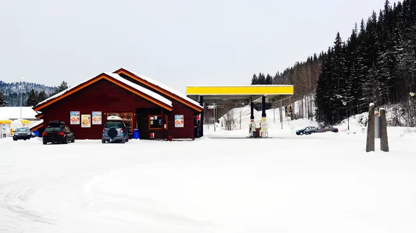Snow covered gas station