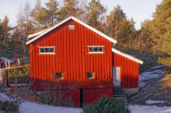 Red barn on farm in winter