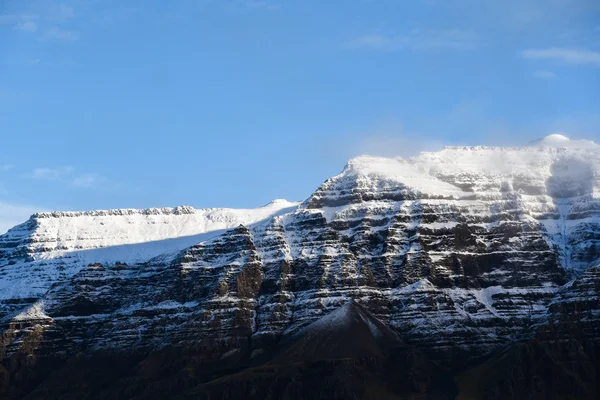 First snow on the top of mountain